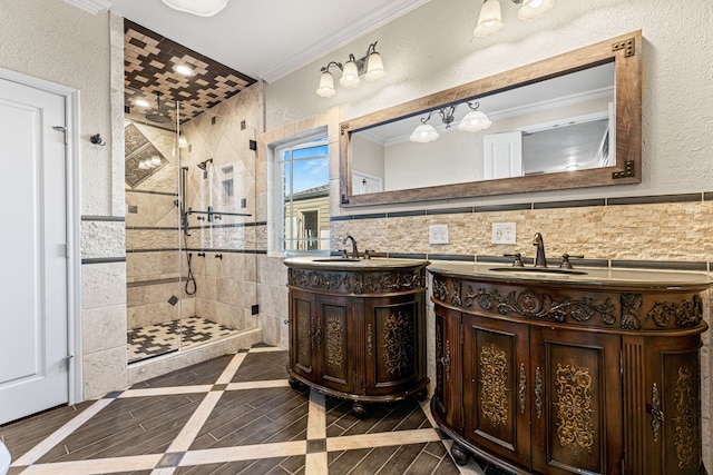 bathroom featuring vanity, a tile shower, ornamental molding, and tile walls