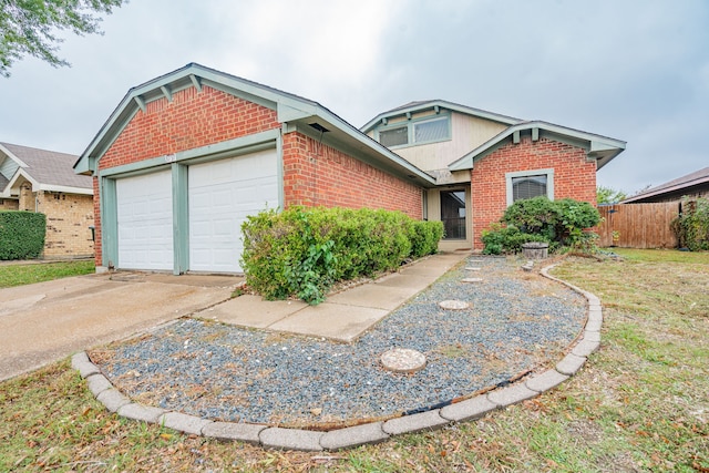 view of front of property featuring a garage