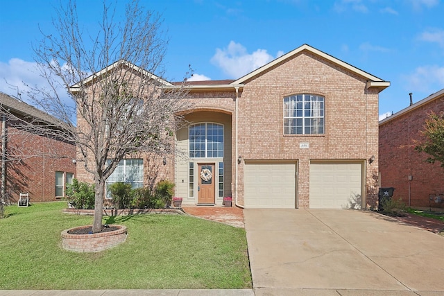 view of front property featuring a front yard and a garage