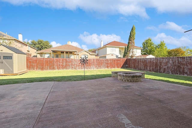 view of patio / terrace with a fire pit