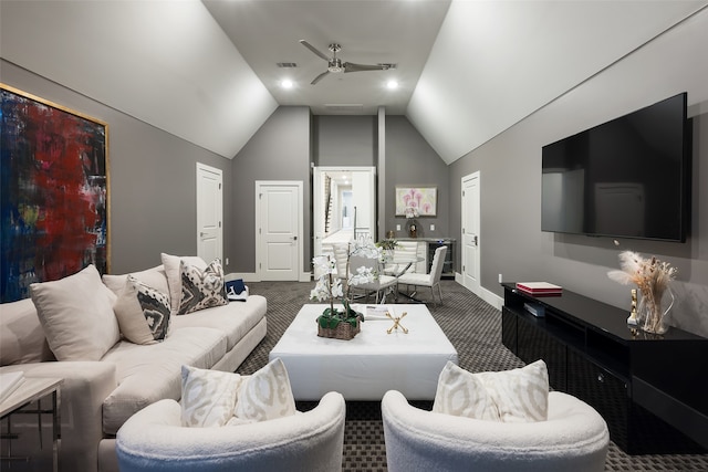 living room with dark carpet, ceiling fan, and lofted ceiling