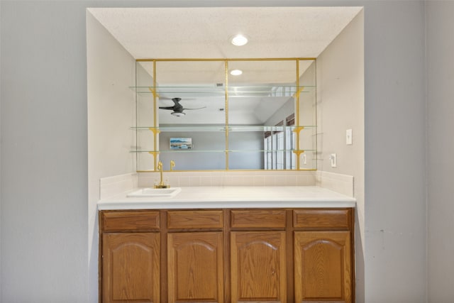 bathroom with vanity and ceiling fan