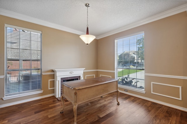 office space with a fireplace, crown molding, and dark hardwood / wood-style flooring