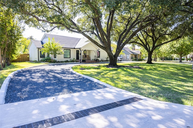 view of front of house with a front lawn