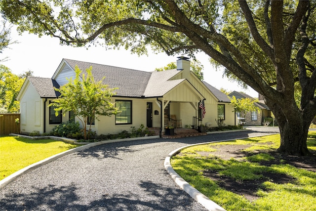 view of front of house with a front lawn