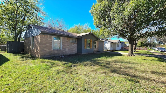 view of property exterior with a lawn