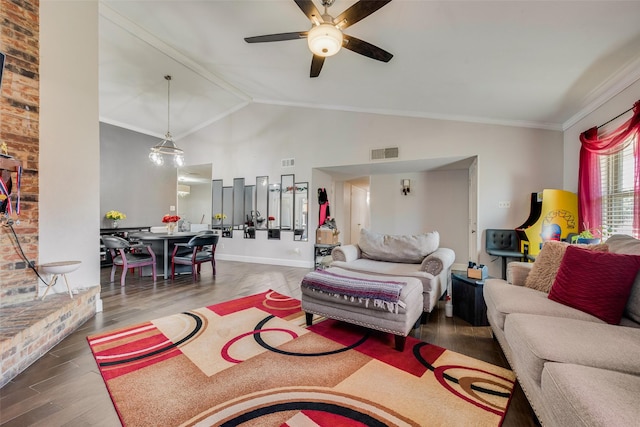 living room with crown molding, visible vents, vaulted ceiling, and wood finished floors