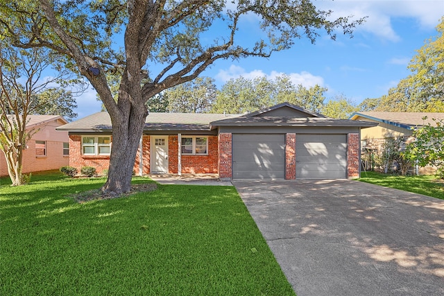 single story home with a garage and a front lawn