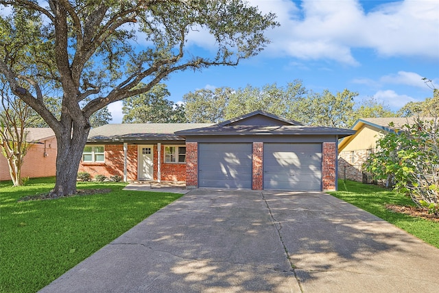 ranch-style home with a front yard and a garage