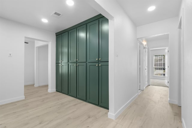 corridor featuring light hardwood / wood-style flooring