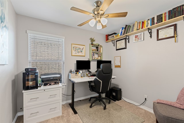 office with ceiling fan and light colored carpet