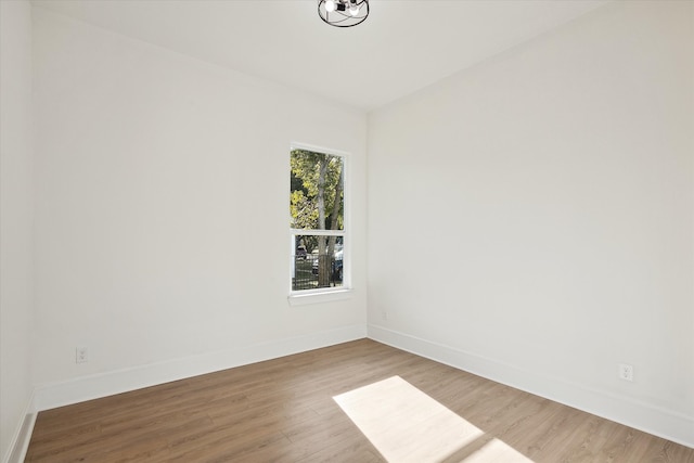 empty room featuring hardwood / wood-style floors