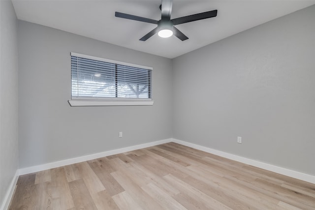 spare room with ceiling fan and light hardwood / wood-style flooring