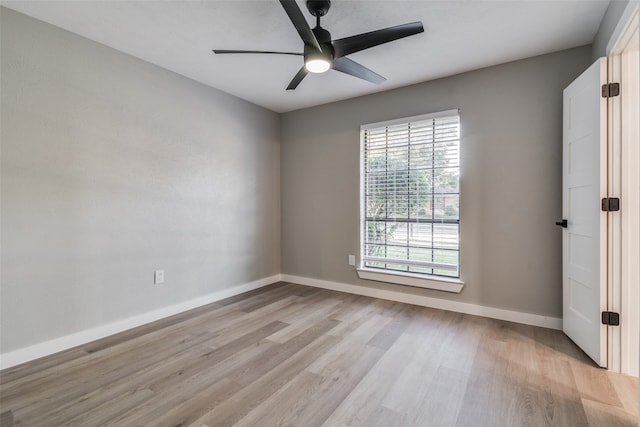 unfurnished room featuring ceiling fan and light hardwood / wood-style floors