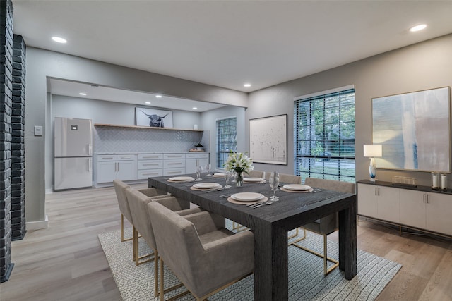 dining room featuring light hardwood / wood-style flooring