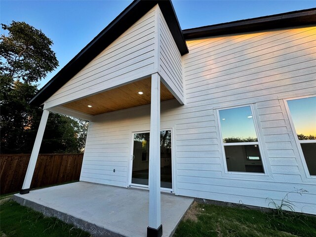 back of property with a patio area