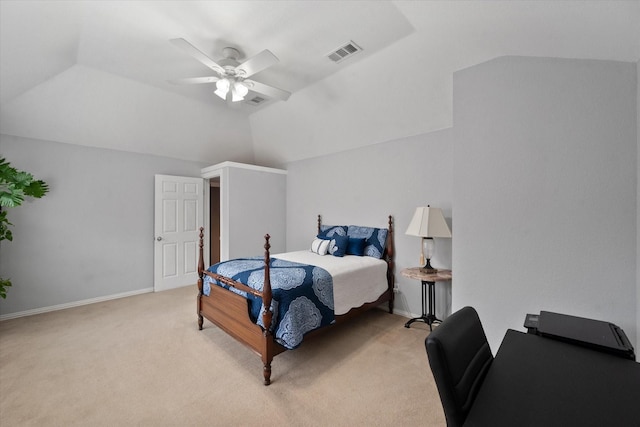 carpeted bedroom with vaulted ceiling and ceiling fan