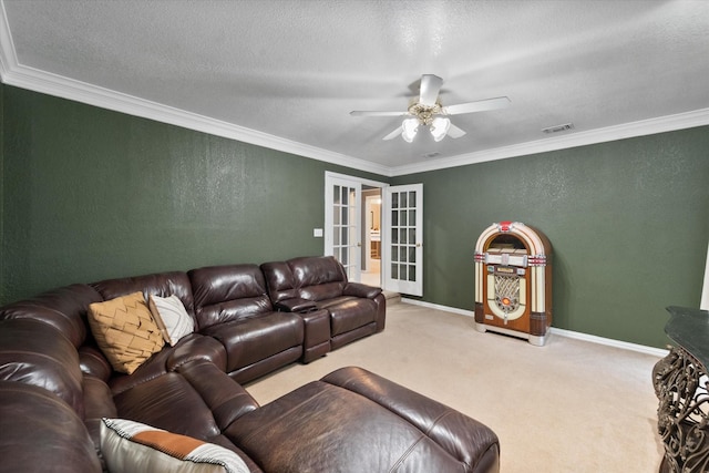 carpeted living room with crown molding, ceiling fan, french doors, and a textured ceiling