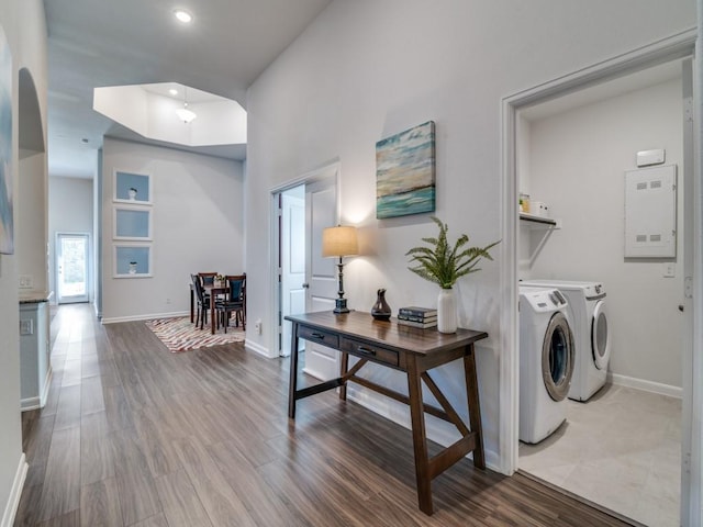 1523 Green Meadows Way, Wylie, TX 75098 - laundry room with washer and clothes dryer, baseboards, wood finished floors, and recessed lighting