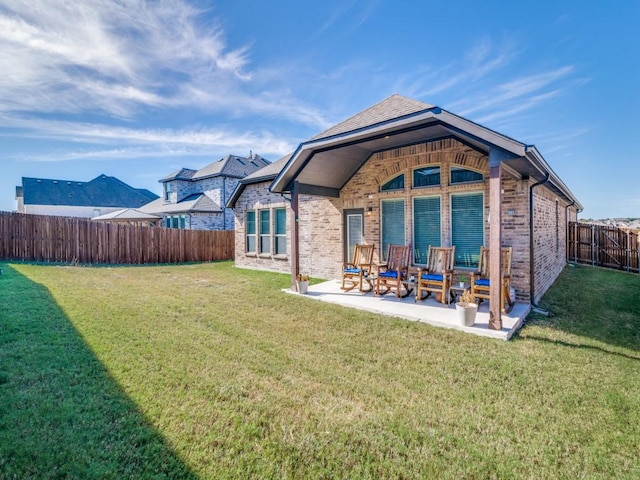 1523 Green Meadows Way, Wylie, TX 75098 - rear view of property featuring brick siding and a patio