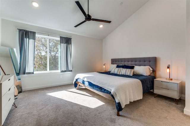 carpeted bedroom featuring ceiling fan and lofted ceiling