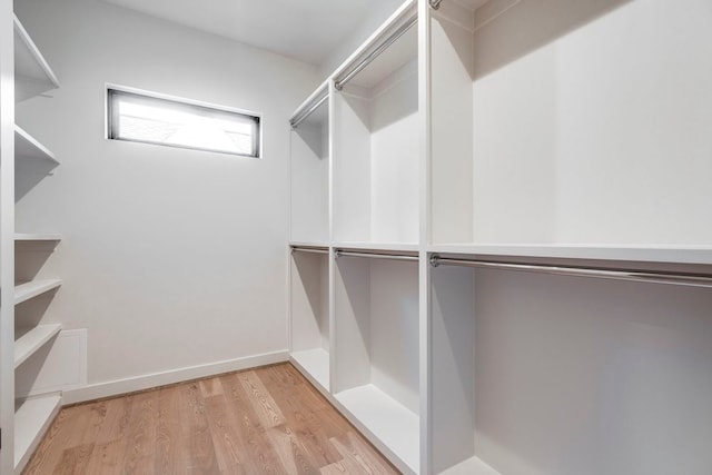 walk in closet featuring light wood-type flooring