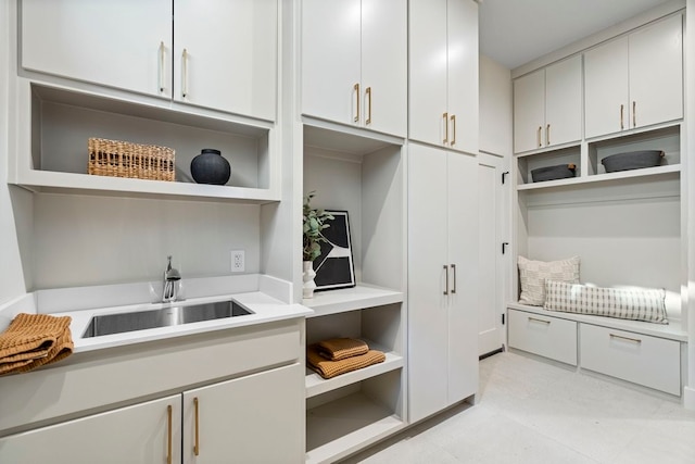 kitchen with white cabinets and sink