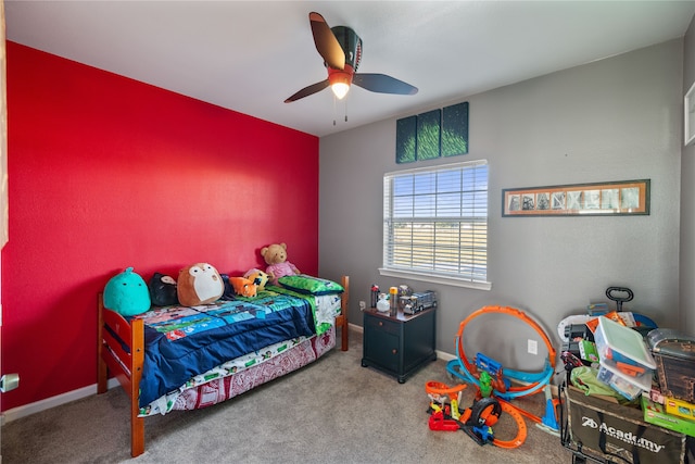 carpeted bedroom with ceiling fan