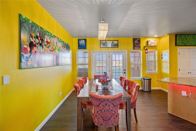 dining room featuring dark hardwood / wood-style flooring and french doors