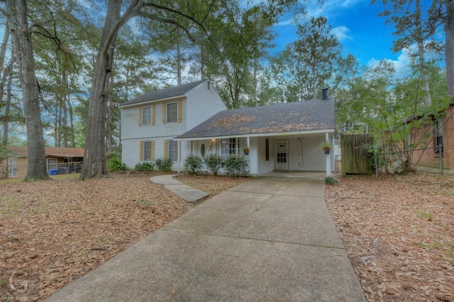 view of front of home featuring a carport