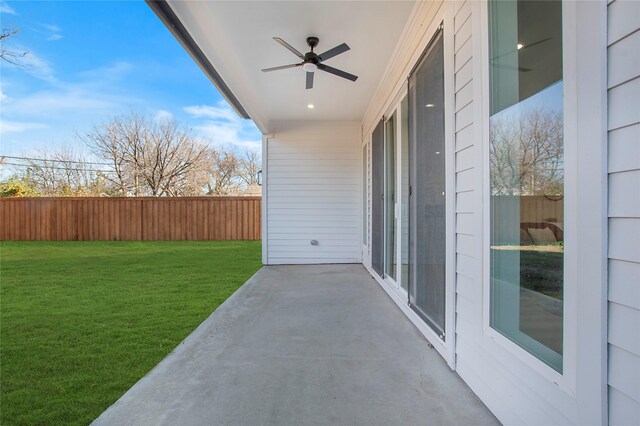 view of patio featuring ceiling fan