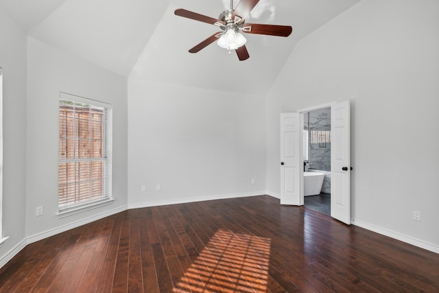 unfurnished room with dark hardwood / wood-style floors, high vaulted ceiling, and ceiling fan