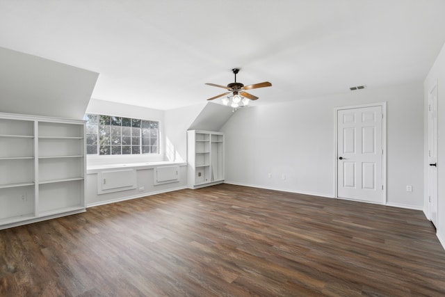 unfurnished living room featuring dark hardwood / wood-style floors and ceiling fan