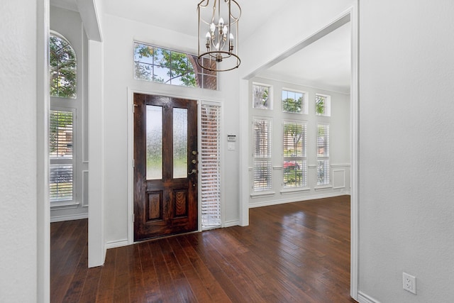 1920 Templehill Dr, Plano, TX 75075 - entryway with dark wood finished floors, a chandelier, and baseboards