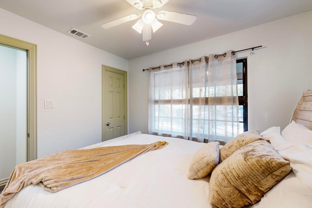 bedroom featuring ceiling fan