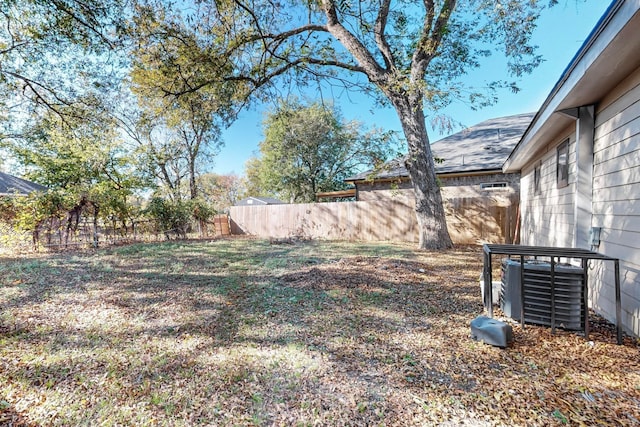 view of yard featuring central AC unit