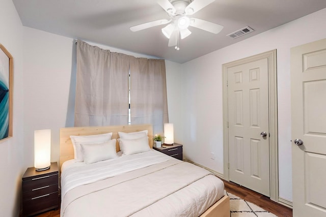 bedroom featuring ceiling fan and wood-type flooring