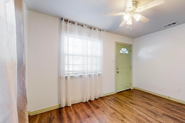 entryway with ceiling fan and hardwood / wood-style floors