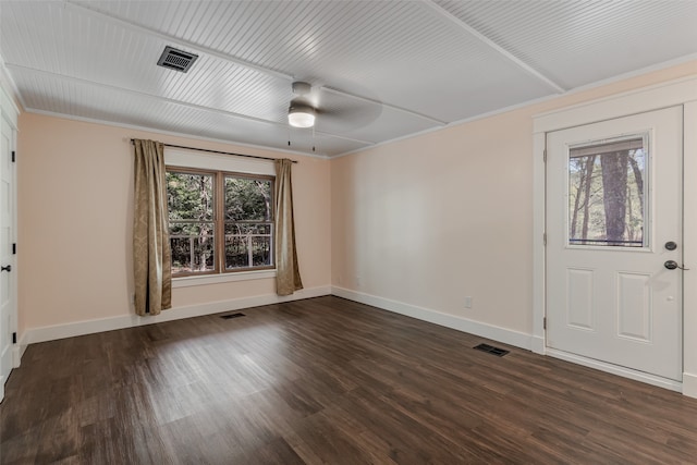 foyer with dark hardwood / wood-style flooring, ceiling fan, and crown molding