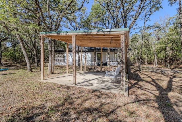 exterior space featuring a carport