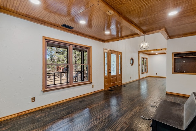 foyer entrance featuring hardwood / wood-style floors, wooden ceiling, a notable chandelier, and beam ceiling