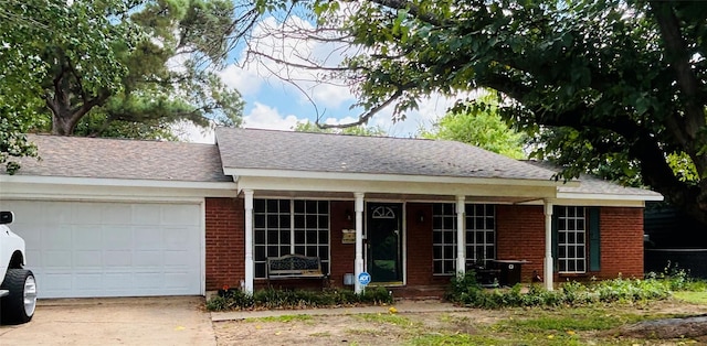 single story home with a garage