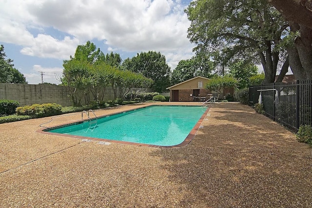 view of swimming pool featuring a patio