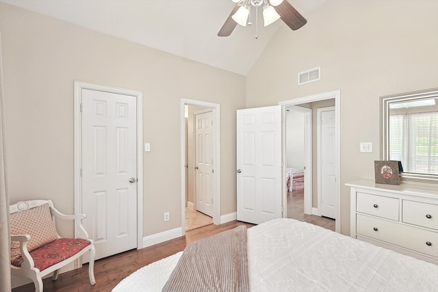 bedroom featuring ceiling fan, high vaulted ceiling, and light hardwood / wood-style floors