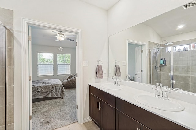 bathroom with tile patterned flooring, walk in shower, vanity, ceiling fan, and lofted ceiling