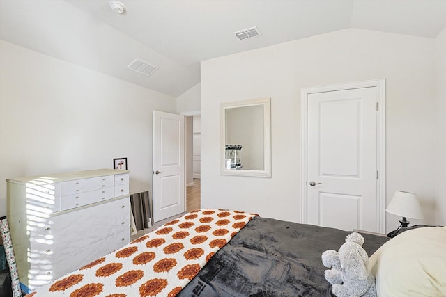 bedroom with vaulted ceiling