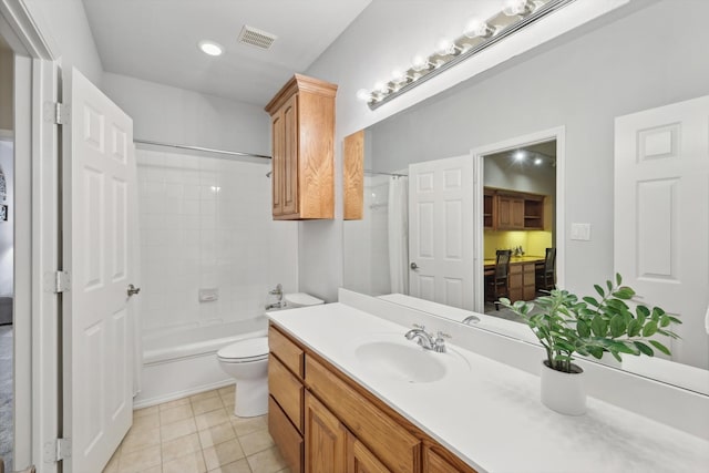 full bathroom featuring tile patterned flooring, vanity, toilet, and shower / bathtub combination with curtain