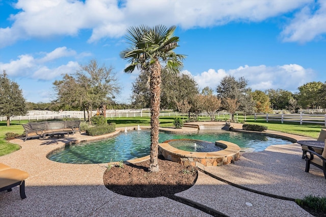 view of pool with an in ground hot tub