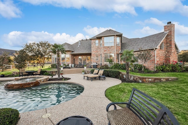 exterior space featuring a patio area and a yard