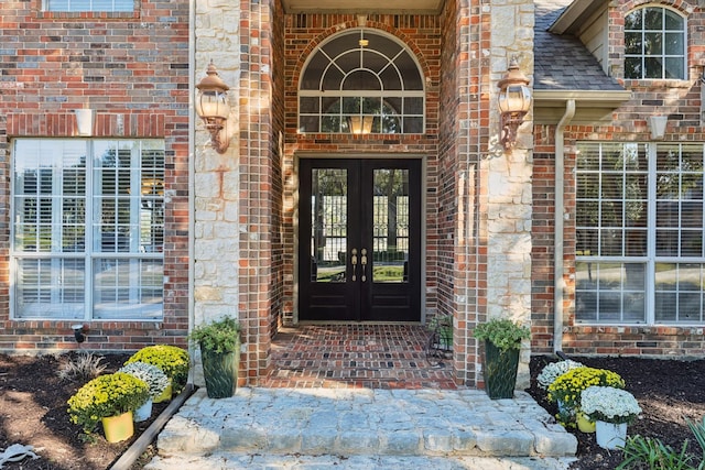 entrance to property featuring french doors